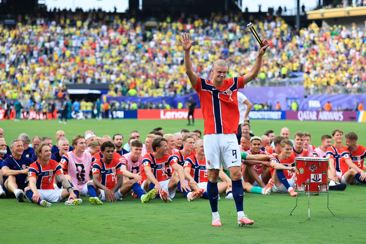 EAST RUTHERFORD, NEW JERSEY - JULY 05: Erling Haaland #9 of Norway leads teammates in the Viking Row to celebrate the 2-1 victory during the FIFA World Cup 2026 Round of 16 match between Brazil and Norway at New York New Jersey Stadium on July 05, 2026 in East Rutherford, New Jersey. (Photo by Elsa/Getty Images)